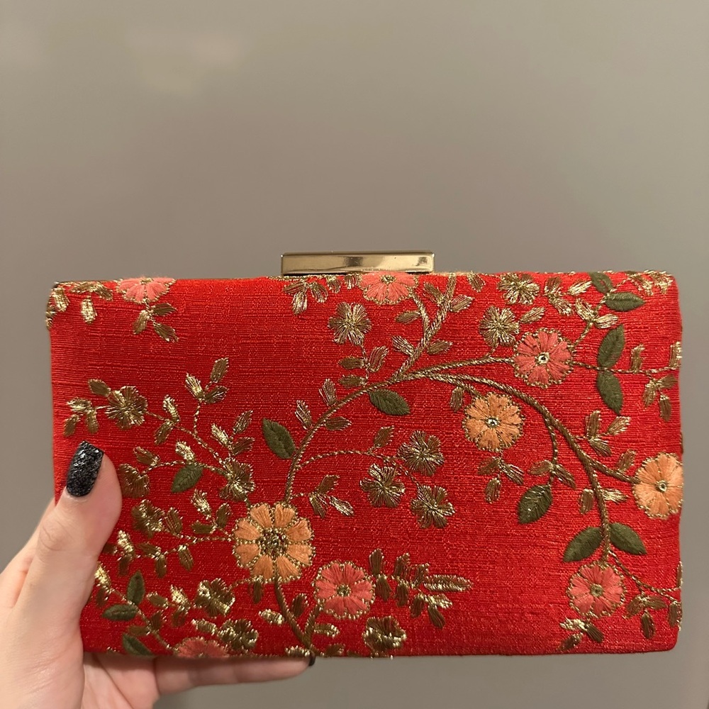 Amyra red embroidered Indian clutch